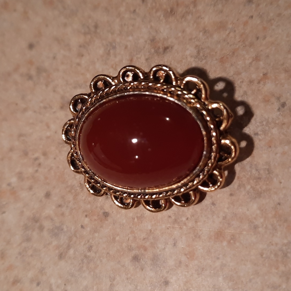 Pretty carnelian like stone brooch